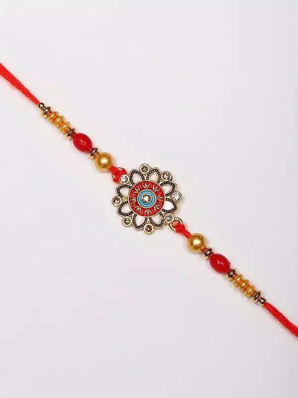 Exotic India Floral Enamelled Rakhi With Kumkum And Akshat 