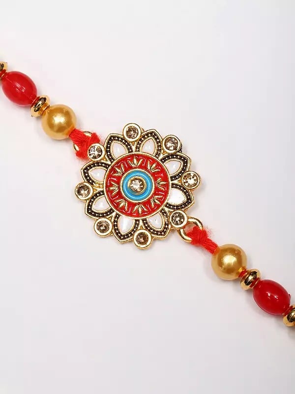 Exotic India Floral Enamelled Rakhi With Kumkum And Akshat 