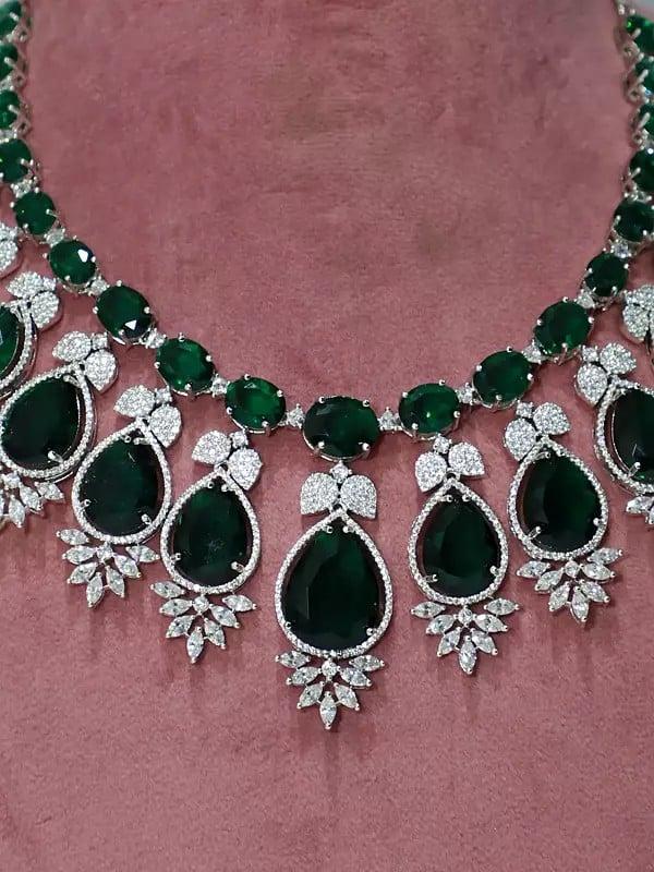 Exotic India Floral Leaf Design Stone Studded American Diamond Necklace Set With Earrings 