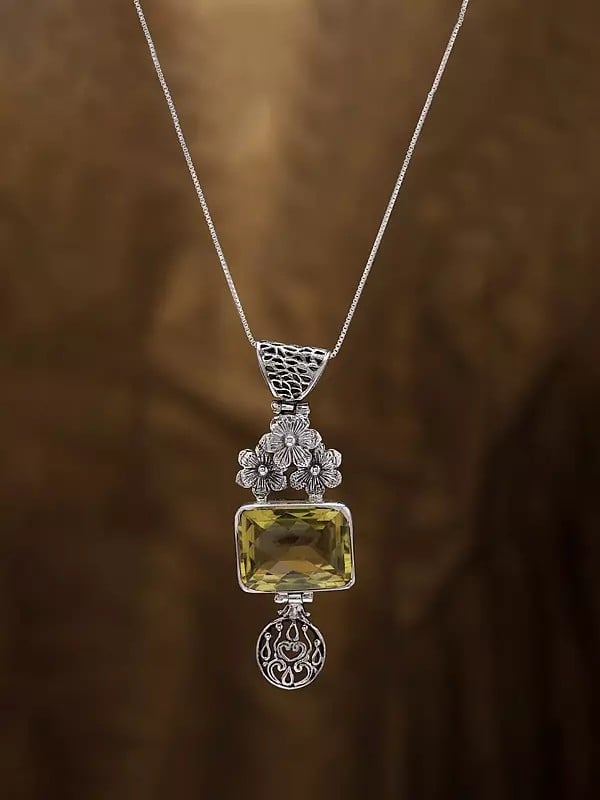 Exotic India Floral Sterling Silver Pendant With Rectangle Shaped Lemon Quartz 
