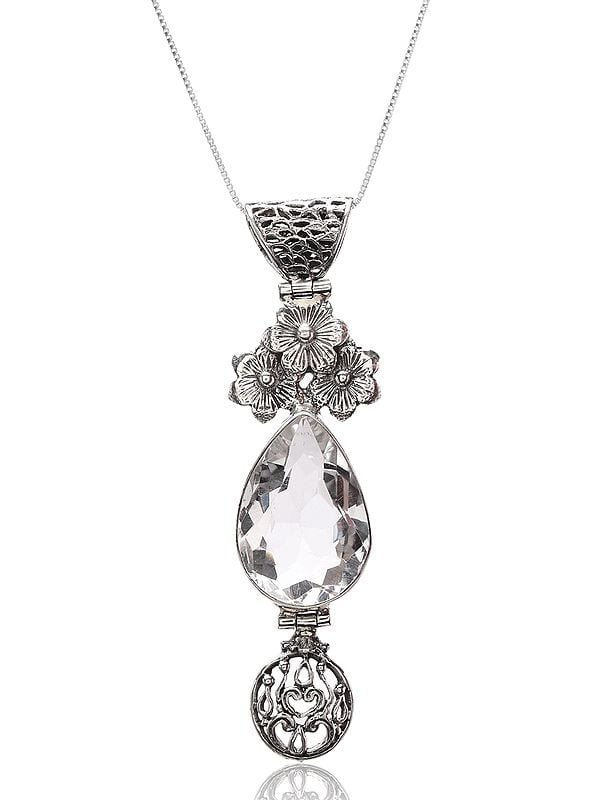 Exotic India Floral Sterling Silver Pendant With Teardrop Shaped Crystal 