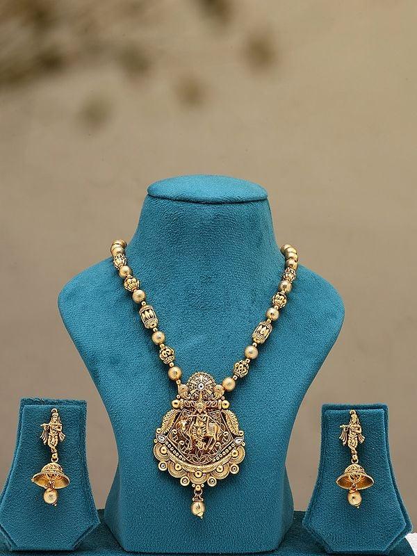 exotic india Fluting Krishna Necklace and Earrings Set