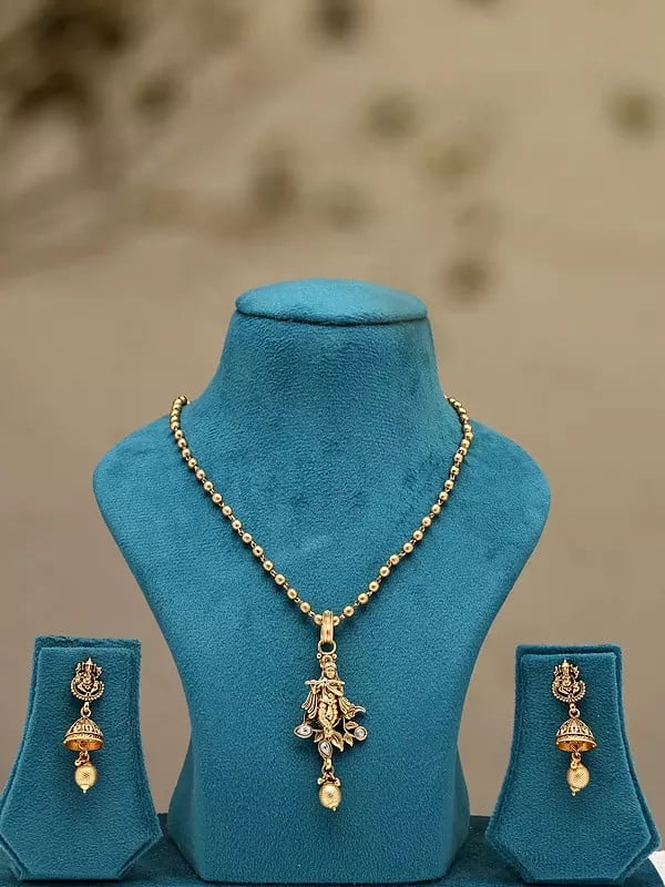 exotic india Fluting Krishna Necklace Set with Earrings 