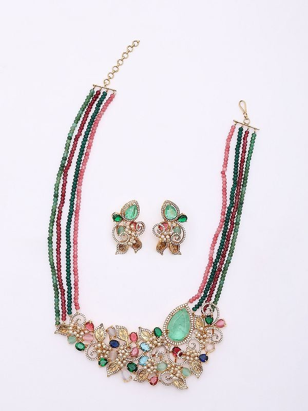 Exotic India Four Strand Multi Stone Studded Floral Design Necklace And Earrings Set 