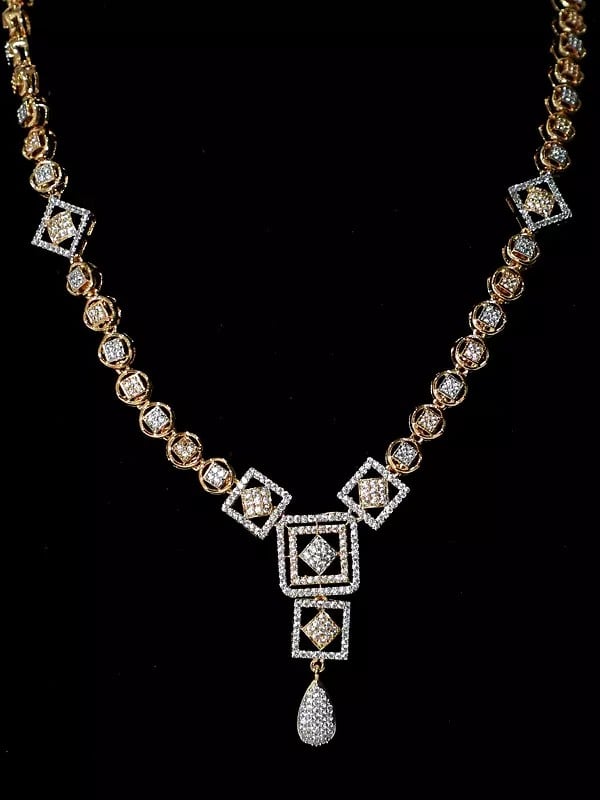 Exotic India Geometric Design Embellished Stone Studded American Diamond Necklace Set With Earrings 
