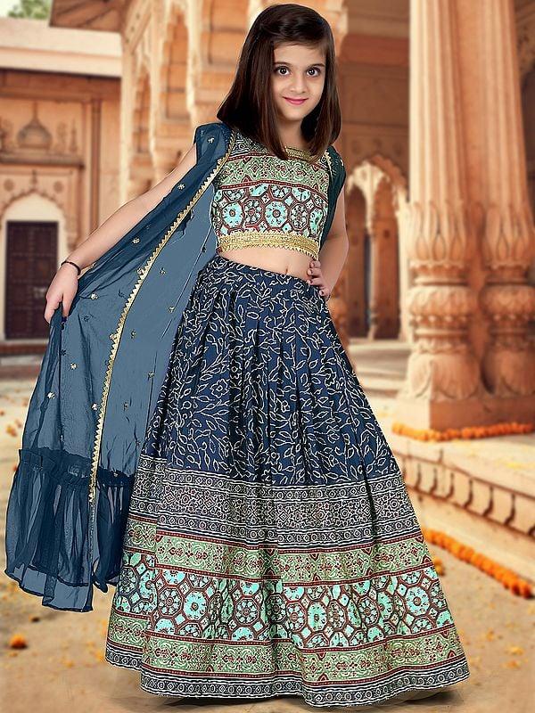 Exotic India Georgette Ajrakh Printed And Sequins Work Designer Kids Lehenga Choli With Jacket 