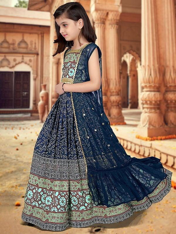 Exotic India Georgette Ajrakh Printed And Sequins Work Designer Kids Lehenga Choli With Jacket 