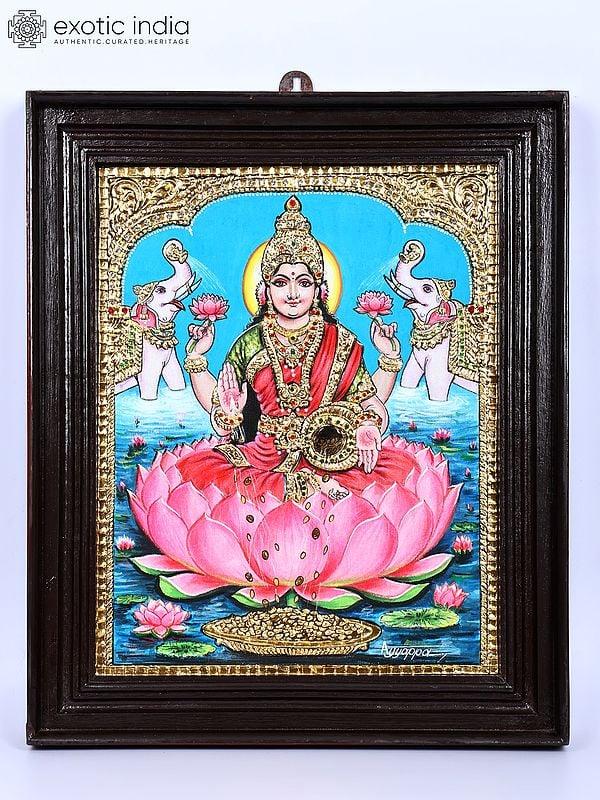 exotic india Goddess Gajalakshmi Showering Wealth | 24 Karat Gold Work | Framed Tanjore Painting 