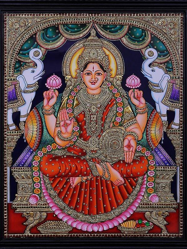 Exotic India Goddess Gajalakshmi Tanjore Painting With Frame | Traditional Colors With 24 Karat Gold 