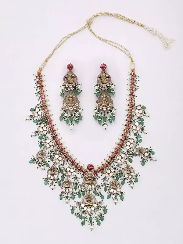 exotic india Goddess Lakshmi Moissanite Polki Kundan Studded Necklace Set with Earrings 