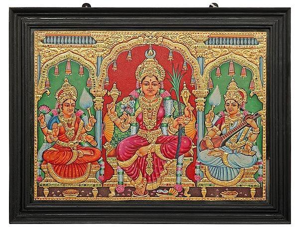 exotic india Goddess Rajarajeshwari Lakshmi and Saraswati Adorned in Their Majestic Finery | Tanjore Painting with Teakwood Frame | Traditional Colors with 24K Gold 