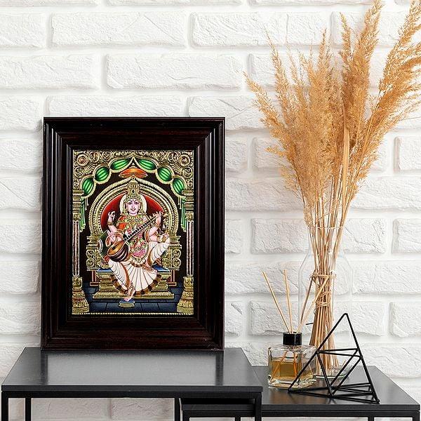 Exotic India Goddess Saraswati Seated In Lalitasana Wearing Sari | Framed Tanjore Painting 