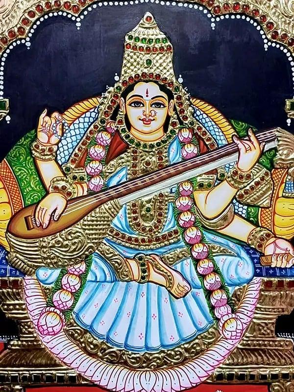 Exotic India Goddess Saraswati Tanjore Painting Playing Veena | Traditional Colors With Gold Work