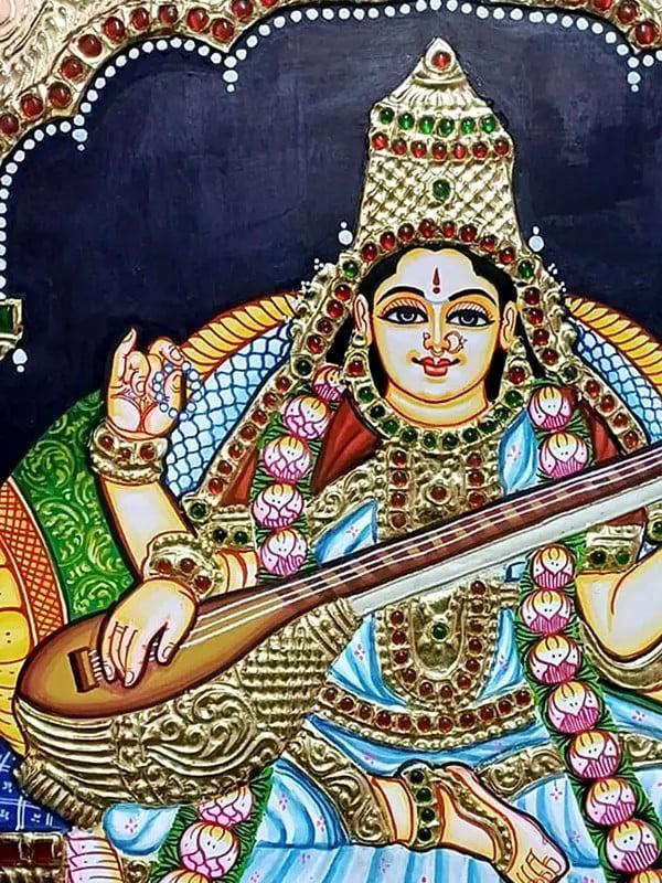 Exotic India Goddess Saraswati Tanjore Painting Playing Veena | Traditional Colors With Gold Work