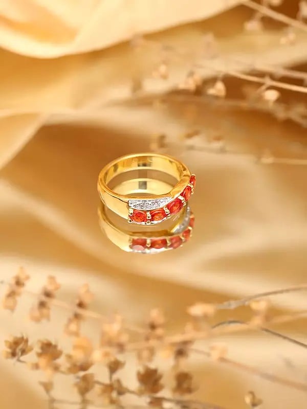 Exotic India Gold Plated Sterling Silver Ring With Faceted Orange Sapphire 