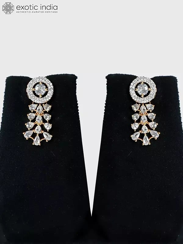 Exotic India Gold Polish Base Stone Studded Embellished American Diamond Necklace Set With Earrings