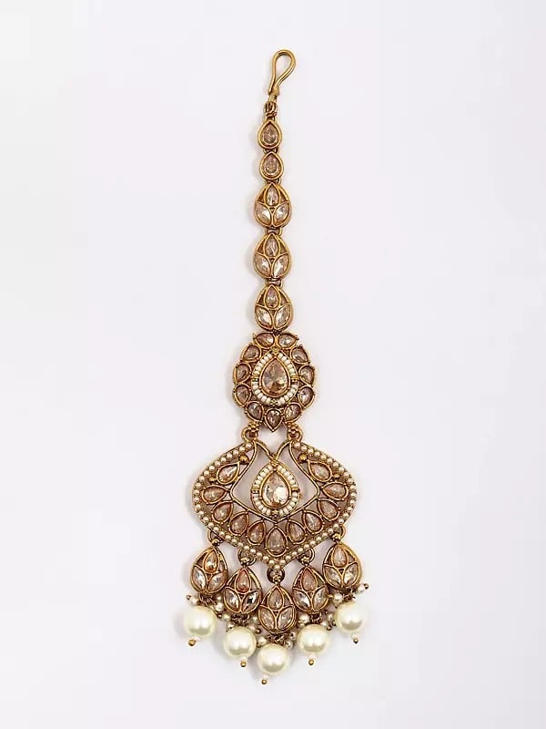 Exotic India Golden And White Stone Studded Necklace Set With Earrings And Mangtika 