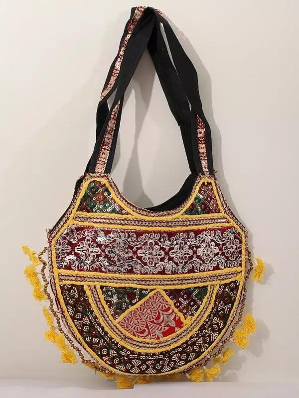 exotic india Handcrafted Upcycled Shoulder Bag with Zari-Sequin Embroidery and Tassels 