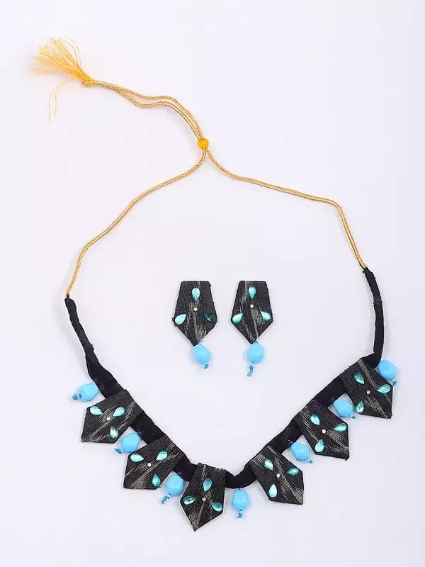 Exotic India Handloom Sambalpuri Fabric Necklace And Earrings Set With Dangling Tumbled Stone