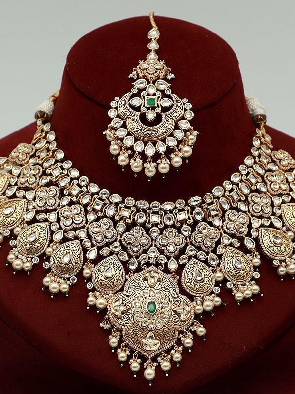 Exotic India Hanging Beads Heavy Kundan Necklace Set With Earrings And Mangtika