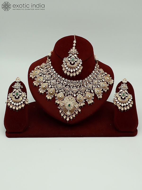 exotic india Hanging Beads Heavy Kundan Necklace Set With Earrings And Mangtika 
