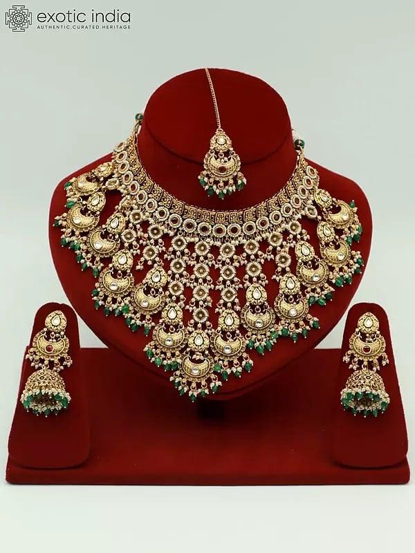 exotic india Hanging Beads Necklace Set With Stunning Earrings And Mangtika