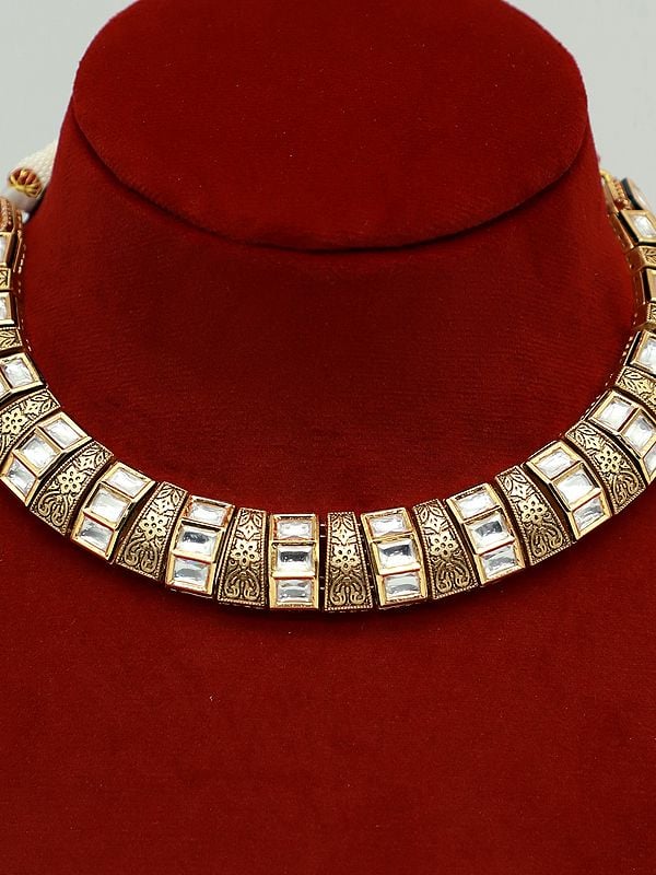 Exotic India Hasli Look Brass Necklace Set With Attractive Carving And Earrings
