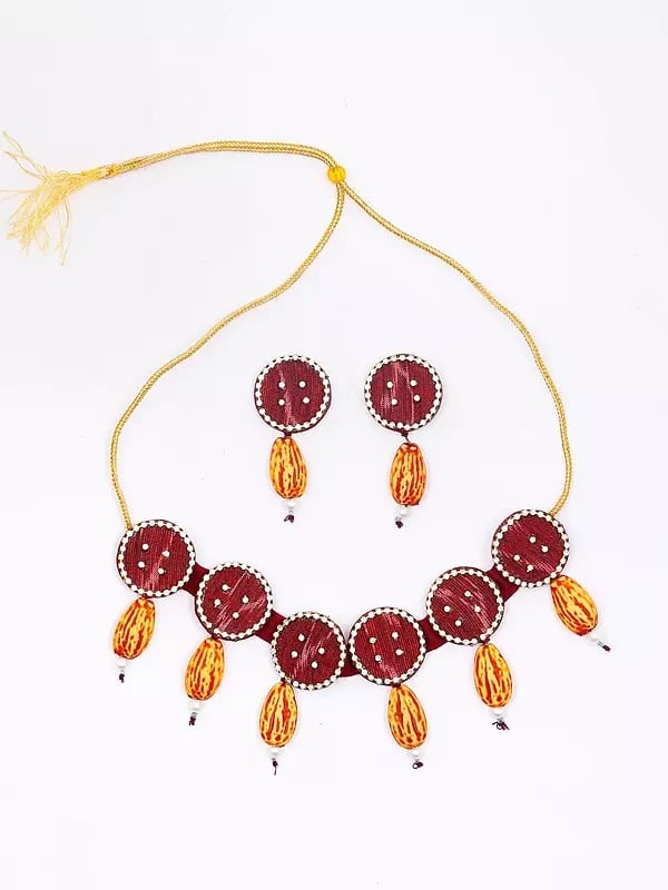 Exotic India Haute-Red Handloom Sambalpuri Fabric Choker & Earrings Set With Dangling Stones 