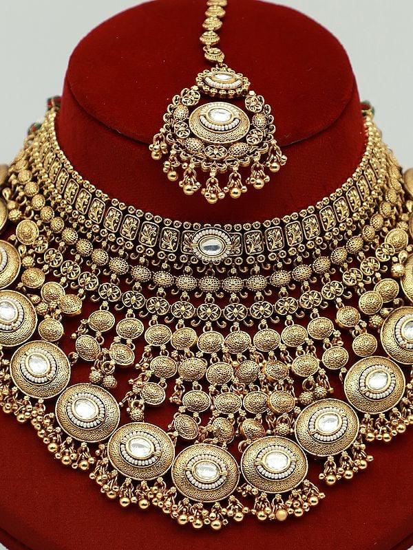 Exotic India Heavy Brass Jewelry Set With Mangtika And Earrings For Bridal 