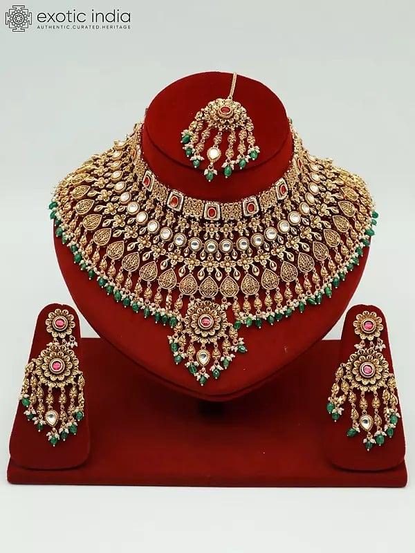 exotic india Heavy Bridal Necklace Set In Brass With Earrings And Mangtika
