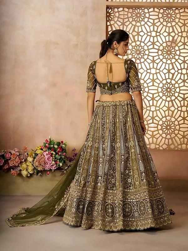 Exotic India Heavy Embroidery And Sequins Work Soft Net Lehenga Choli With Tassels And Matching Floral Dupatta 