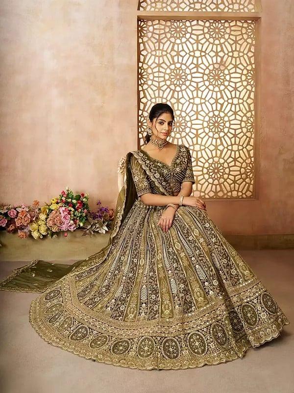 Exotic India Heavy Embroidery And Sequins Work Soft Net Lehenga Choli With Tassels And Matching Floral Dupatta 
