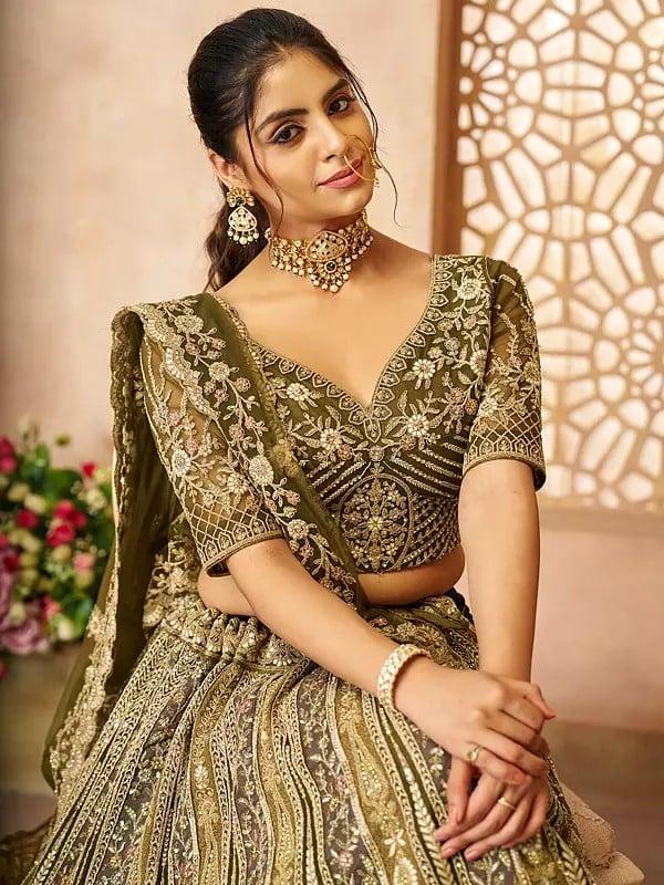 Exotic India Heavy Embroidery And Sequins Work Soft Net Lehenga Choli With Tassels And Matching Floral Dupatta 