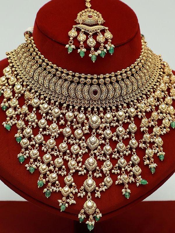 Exotic India Heavy Necklace Set With Hanging Beads And Earrings For Women