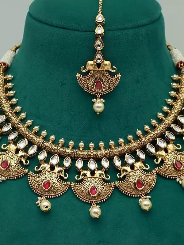 Exotic India Heritage Kundan Studded Necklace Set With Attractive Mangtika And Earrings