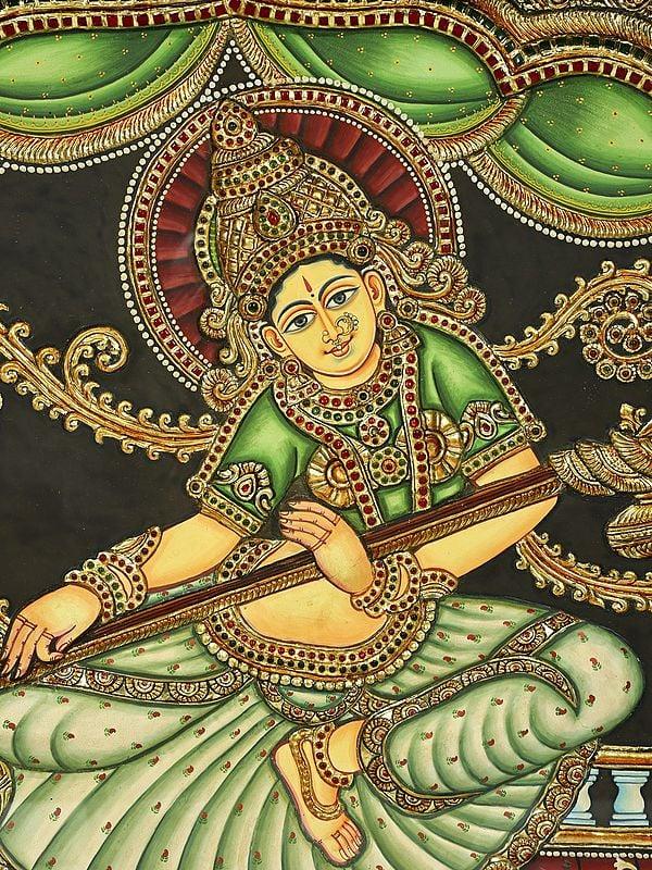 Exotic India Indonesian Saraswati | 24 Karat Gold Work | Framed Tanjore Painting 