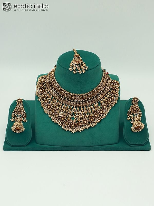 exotic india Intricate Carving Bridal Necklace Set With Beautiful Mangtika And Earrings 