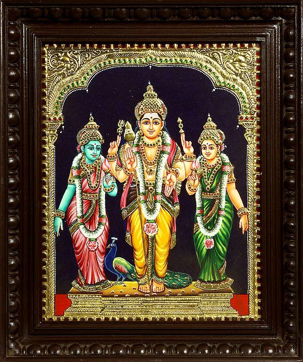 exotic india Karttikeya with His Two Wives Valli and Deivayanai | Tanjore Painting 