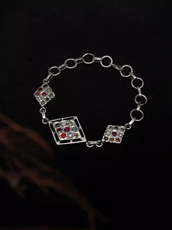 exotic india Kite Shape Sterling Silver Bracelet with Navaratna 