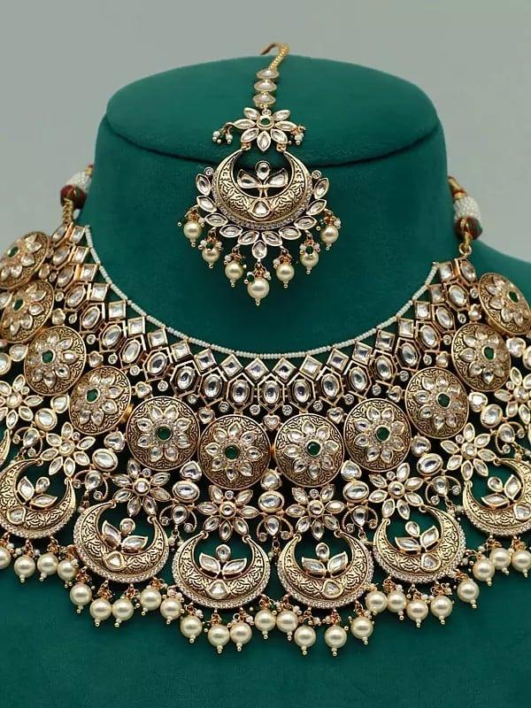 Exotic India Kundan Heavy Necklace Set For Bridal With Earrings And Mangtika
