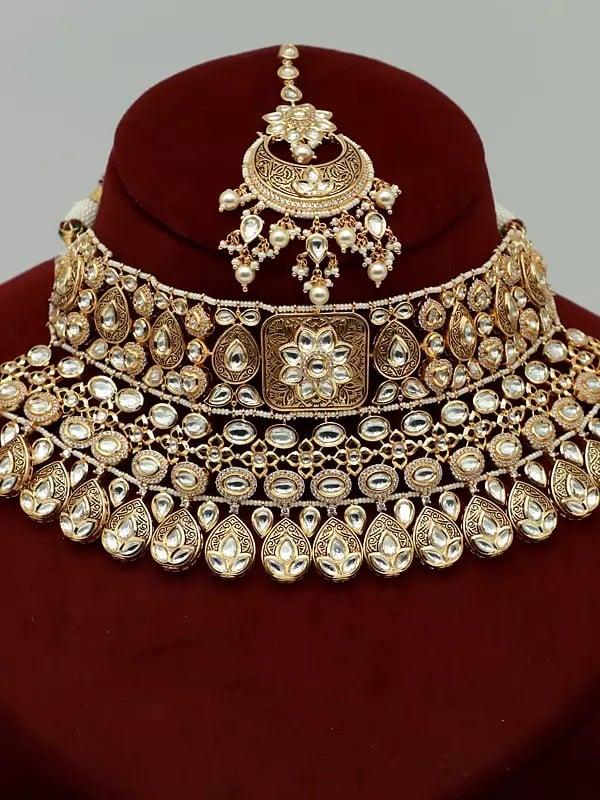 Exotic India Kundan Pearl Studded Necklace Set With Mangtika & Earrings