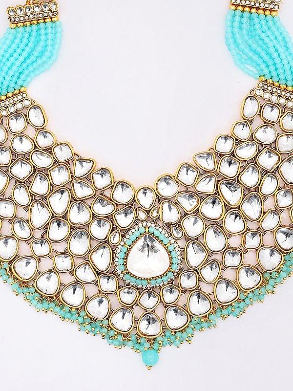 Exotic India Kundan Studded And Beaded Necklace Set With Earrings And Mangtika