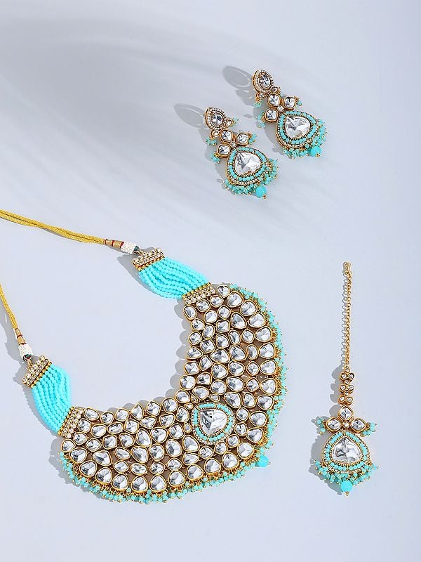 exotic india Kundan Studded and Beaded Necklace Set with Earrings and Mangtika 