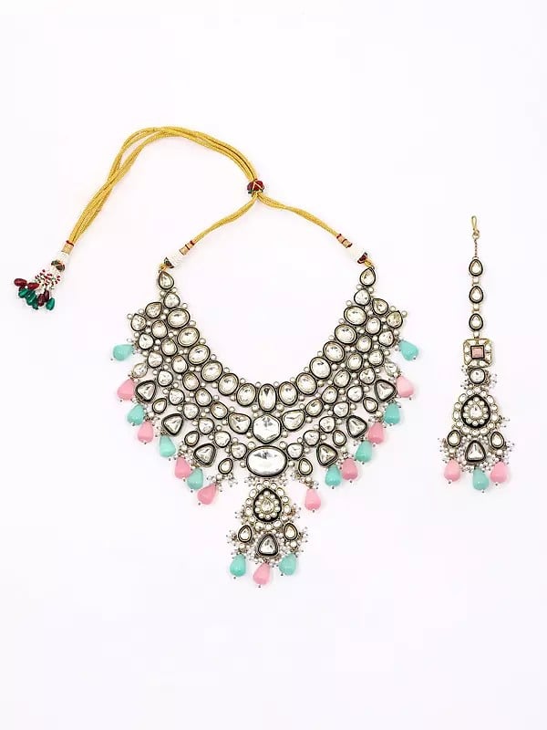 Exotic India Kundan Studded Three Layered Necklace Set With Earrings And Mangtika With Beads Drop 