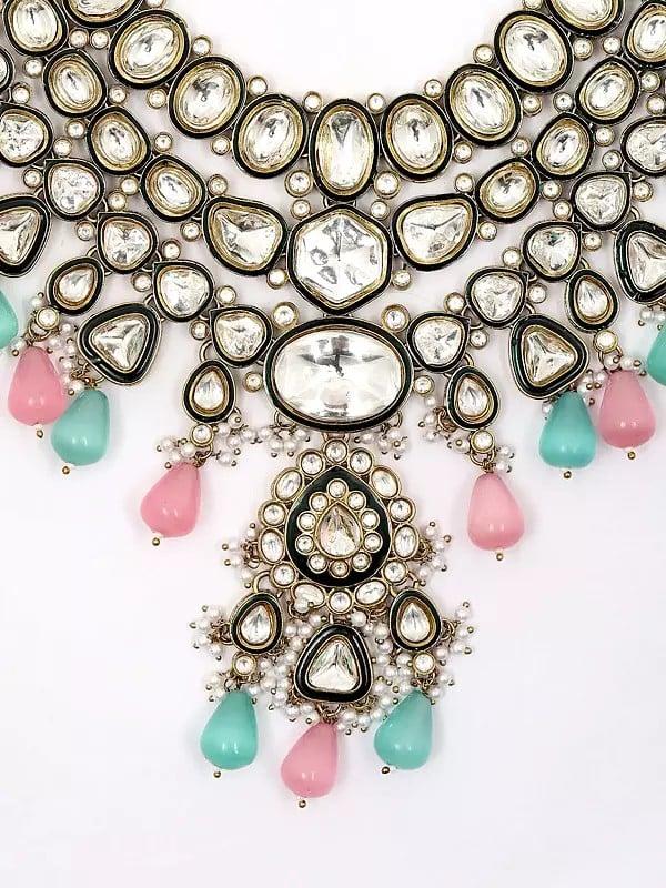 Exotic India Kundan Studded Three Layered Necklace Set With Earrings And Mangtika With Beads Drop 