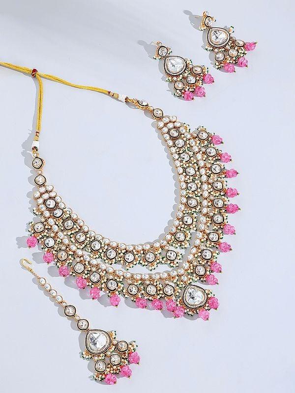 exotic india Kundan Studded Two Layer Necklace with Earrings and Mangtika Set 