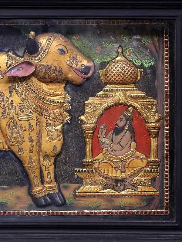 Exotic India Large Kasyapa Worshipping Kamdhenu Tanjore Painting | Traditional Colors With 24K Gold | Teakwood Frame | Gold & Wood