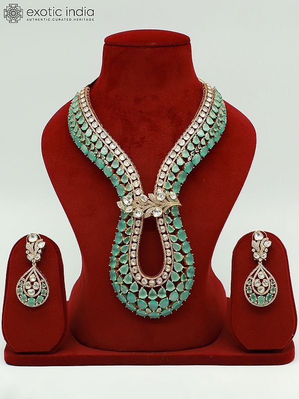 exotic india Long Floral Design Moissanite Kundan With Matt Polish Necklace With Teardrop Earrings 
