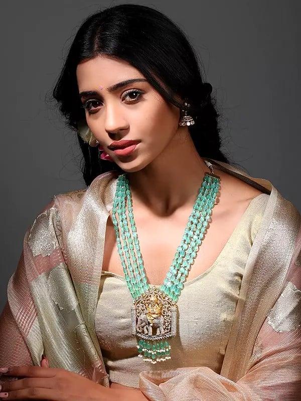 exotic india Lord Ganesha Long Necklace and Earring Set with Multi Strand