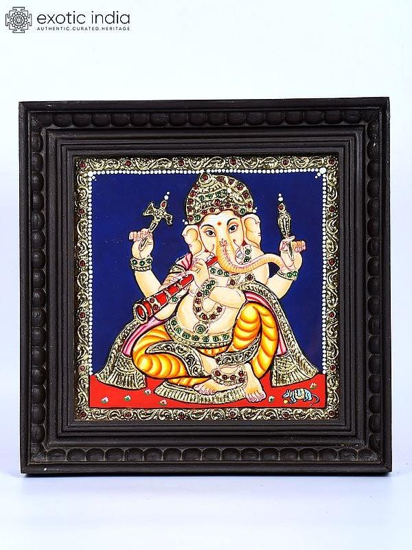 exotic india Lord Ganesha Playing Mangal Vadya Shehnai | 24 Karat Gold Work | Framed Tanjore Painting
